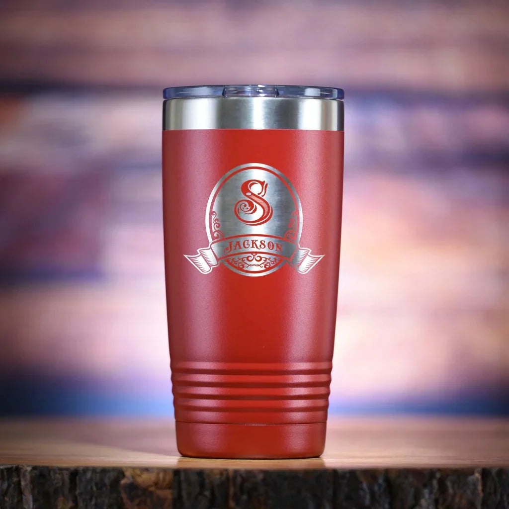 Red insulated travel coffee tumbler engraved with a monogram and name, a personalized Christmas gift for coworkers