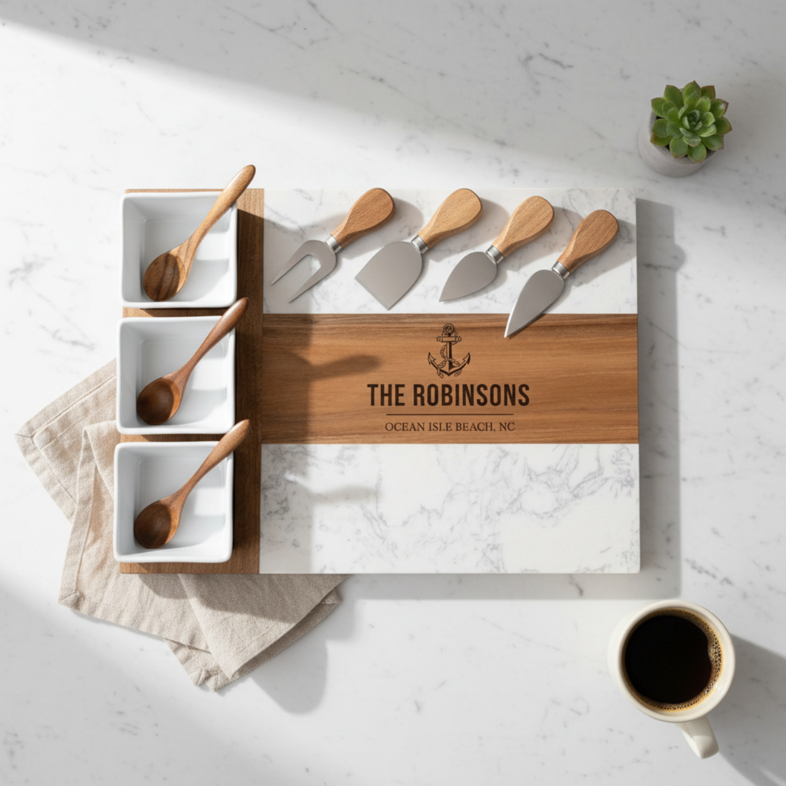 Personalized cutting board set with Coastal design with utensils on a marble surface