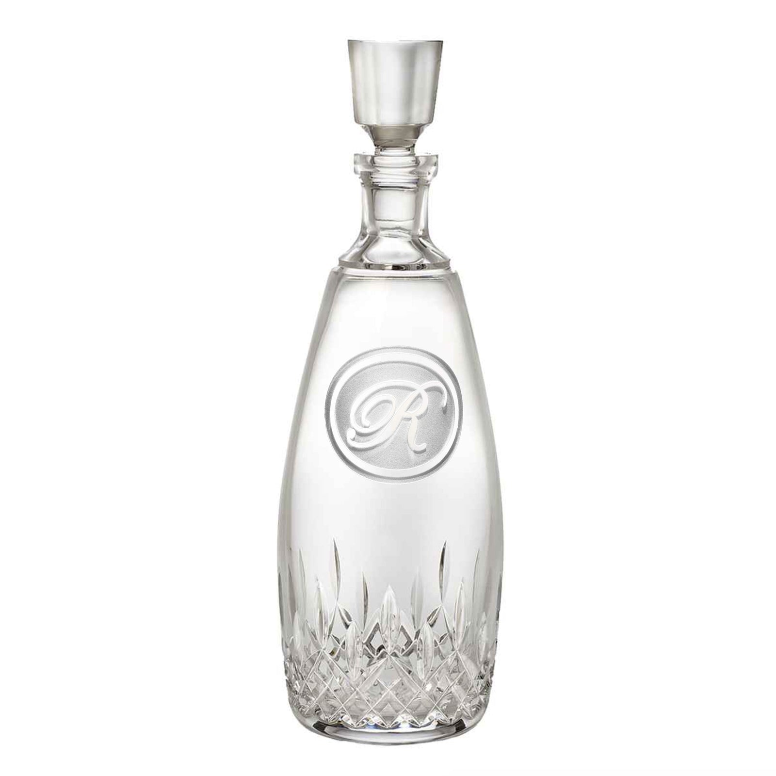 Clear crystal decanter with diamond-cut base and glass stopper, featuring a circular monogram with sample letter "R" engraved on front
