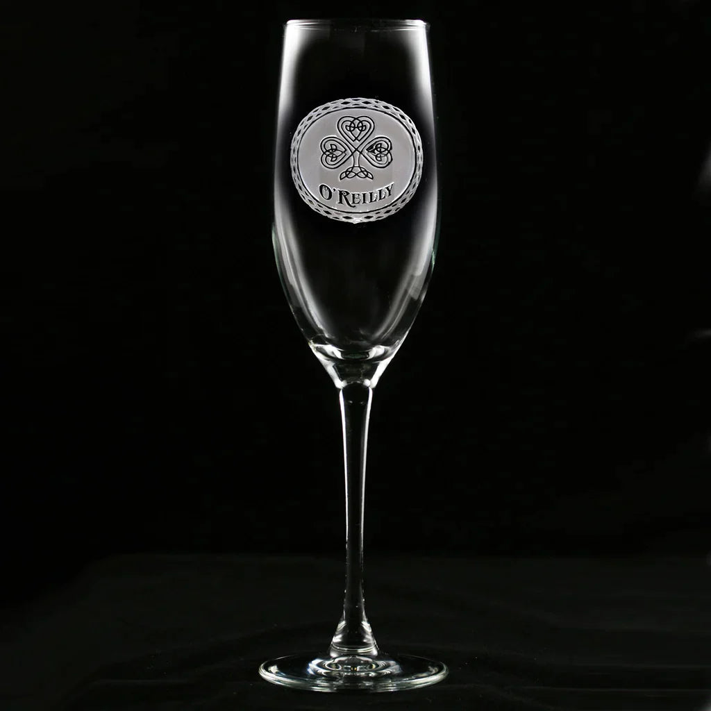 Champagne flute engraved with Celtic shamrock design and sample name "O'REILLY" in circular seal detail