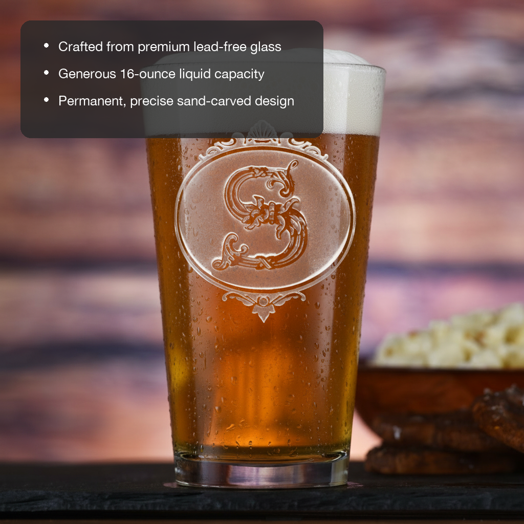 Filigree Personalized Initial Pint Glass features showing premium lead-free glass, 16 oz capacity, and permanent sand-carved design