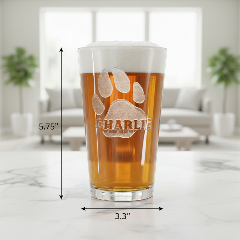 Paw Print Personalized Pint Glass dimensions infographic showing 5.75 inches tall by 3.3 inches wide with 16 oz capacity