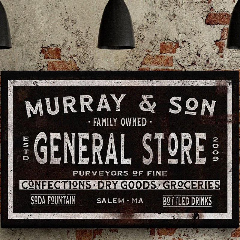 Vintage-style general store sign with distressed black background and cream lettering, featuring sample personalization "Murray & Son" at top, established year 1900, and location Salem, MA.