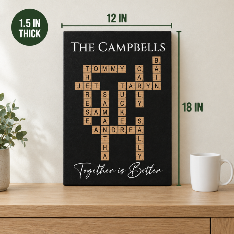 Family Crossword Wall Art on a console table beside a coffee mug with lines marking 12 inches wide by 18 inches tall and a badge showing 1.5 inches thick