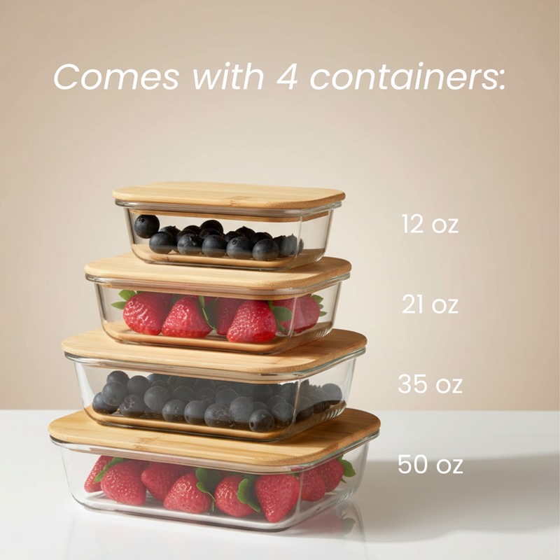 Stacked set of four glass storage containers with bamboo lids in 12 oz, 21 oz, 35 oz, and 50 oz sizes, filled with blueberries and raspberries