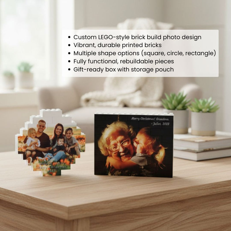 Two assembled building block photo ornaments displayed on wooden surface, one showing family photo with sample text "Wilson Family Merry Christmas 2023" and one showing grandmother with grandchildren and sample text "Merry Christmas! Grandma. - Juliet, 2023