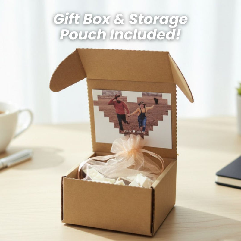 Kraft cardboard gift box with flap opening, displaying a sample photo of two people in a heart-shaped pixelated design, filled with white tissue paper and included storage pouch