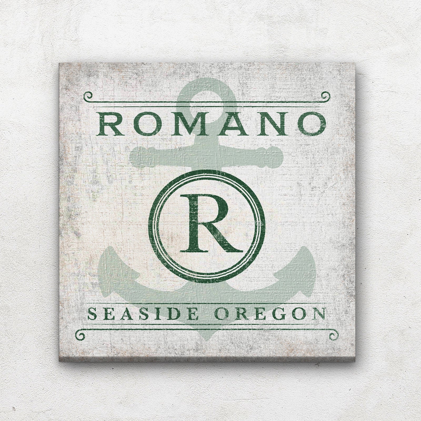 Anchor Monogram Canvas displaying "Hagerty" across the top, a bold "H" inside a circular monogram badge over a large faded anchor, and "Sebago Lake Maine" along the bottom, in slate blue on a distressed cream background