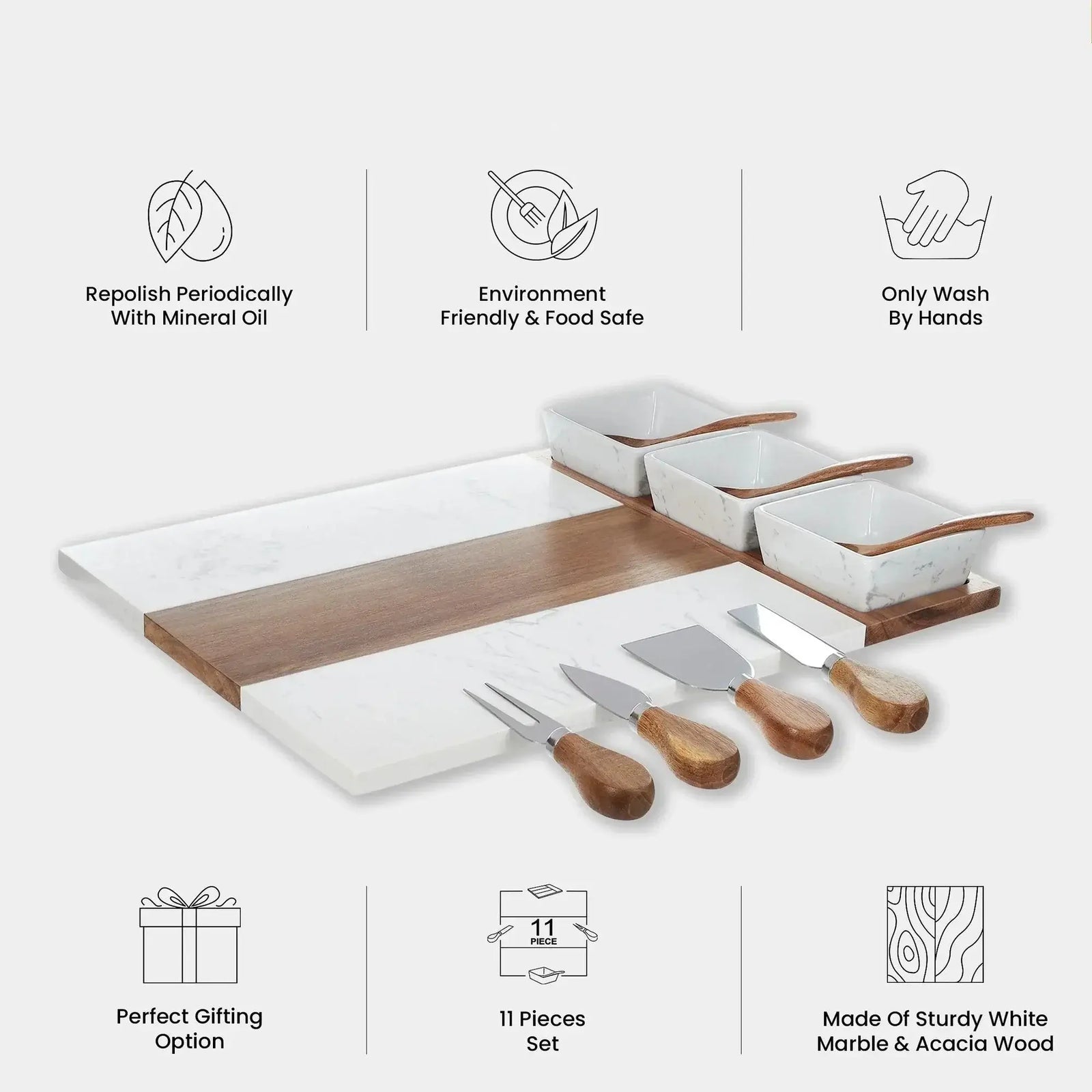 Marble Grove charcuterie board set with white marble and acacia wood, including three small bowls with wooden handles, four cheese knives, and a long serving board, displayed with care instructions.