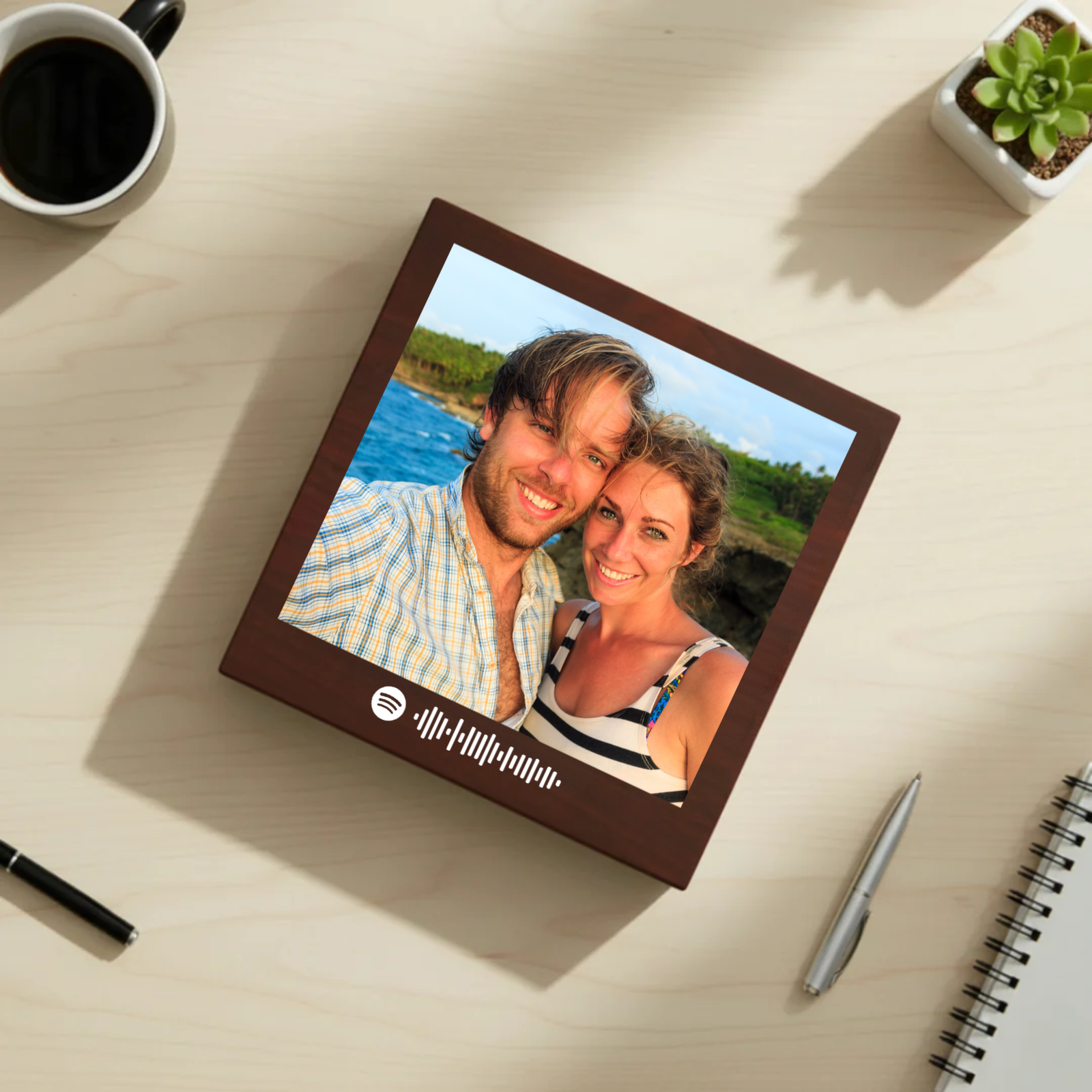 Dark cherry wood keepsake box displaying photo of couple by water, with Spotify code engraved below image on front face