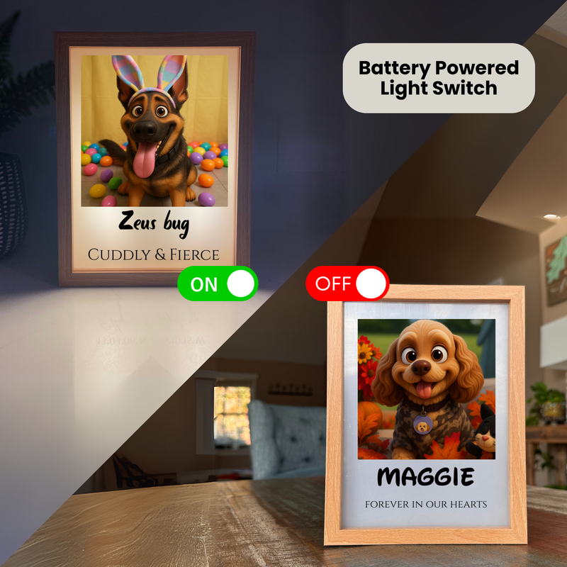Two framed pet portraits with battery-powered light switches—left frame shows German Shepherd with "Zeus bug" and "Cuddly & Fierce" text with ON toggle, right frame displays Cavalier Spaniel labeled "Maggie" and "Forever in Our Hearts" with OFF toggle.