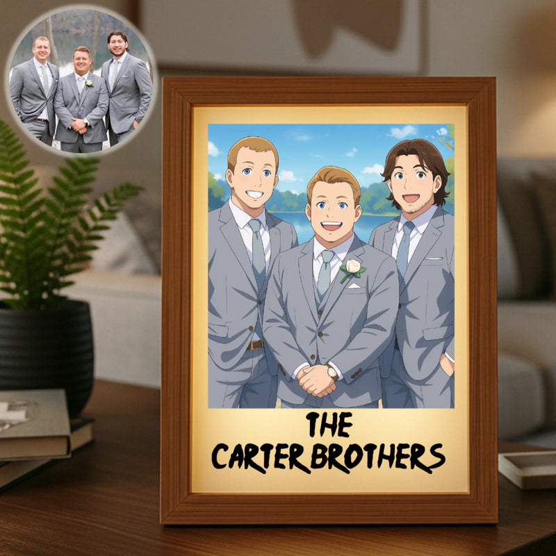Framed anime portrait light box displaying three men in gray suits with sample text "THE CARTER BROTHERS" on wooden desk with potted plant nearby