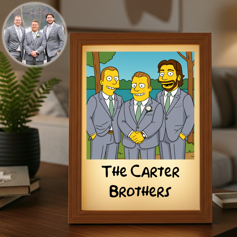 Framed cartoon portrait showing three men in suits with sample text "THE CARTER BROTHERS" below the illustration, displayed on a wooden desk next to a potted plant