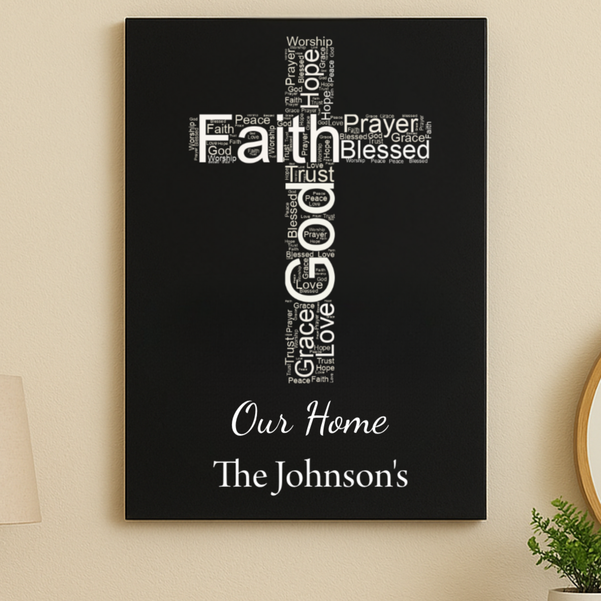 Black wooden sign with white word art cross displaying spiritual terms like Faith, Prayer, and Grace, personalized with sample text "Our Home" and "The Johnson's" at the bottom