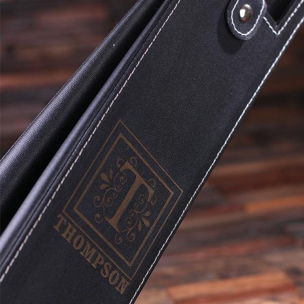Personalized faux leather wine bottle sleeve with engraved initial next to wine bottle
