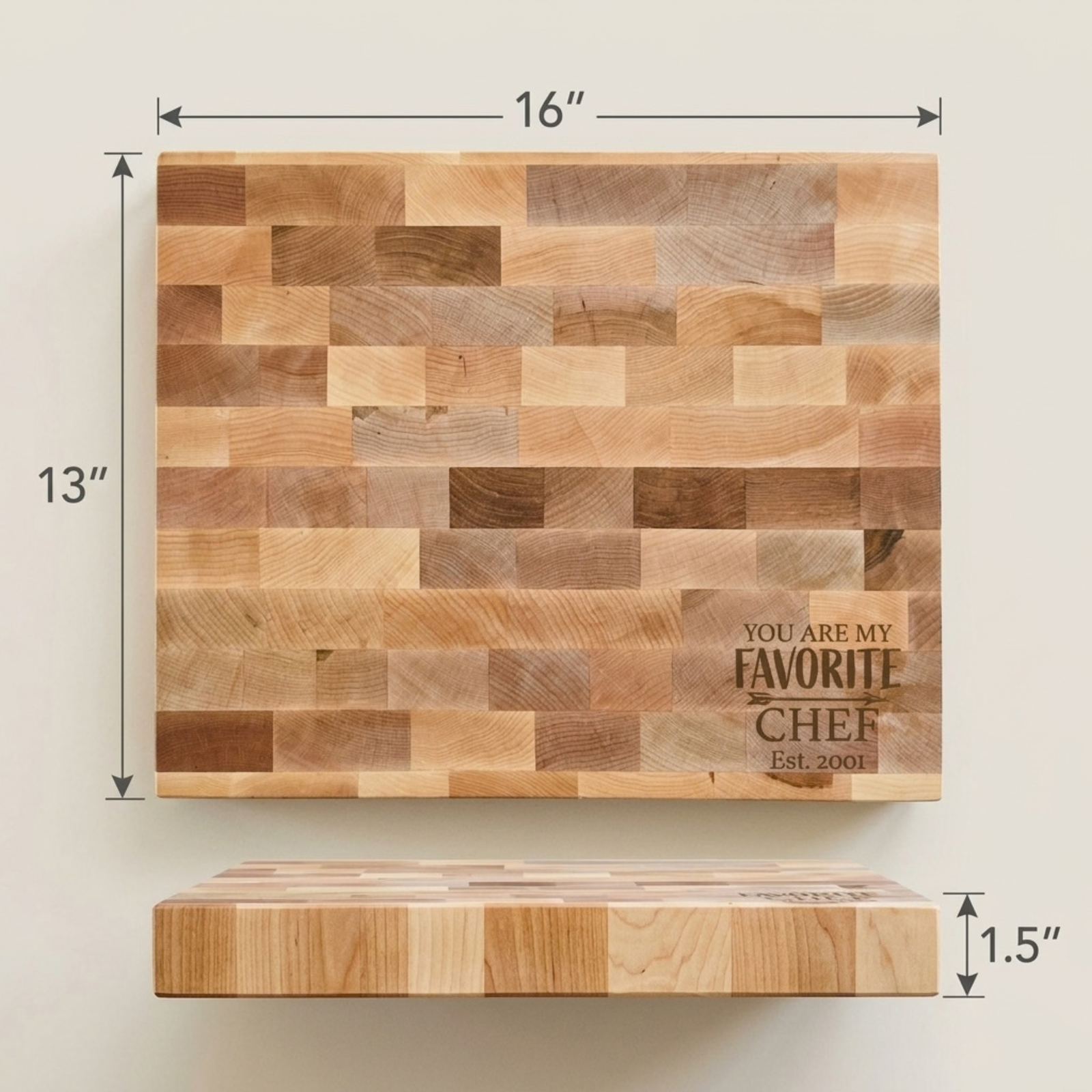 Maple butcher block engraved "You Are My Favorite Chef, Est. 2001" in the Design 2 sample, styled with a chef's knife and citrus
