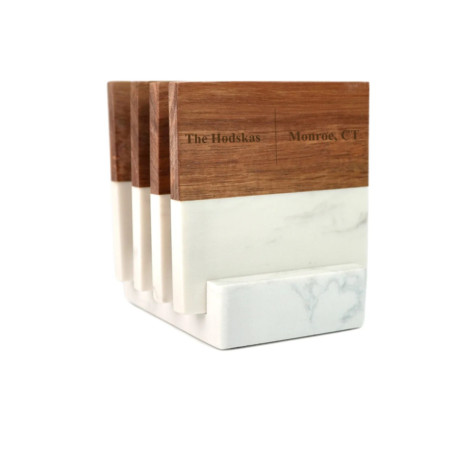 Set of four marble and wood coasters with sample engraving reading "The Hodskas" and "Monroe, CT