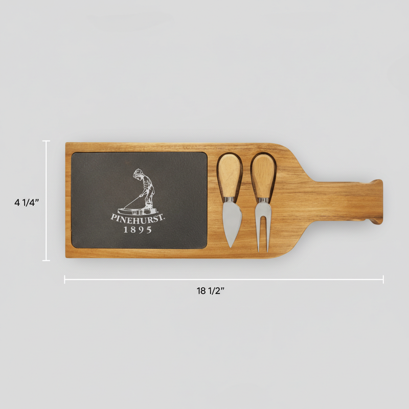 Wooden serving tray with slate insert engraved with sample "Pinehurst 1895" logo and golf figure, two cheese spreaders with wood handles stored in slots, measuring 18 1/2" long by 4 1/4" tall