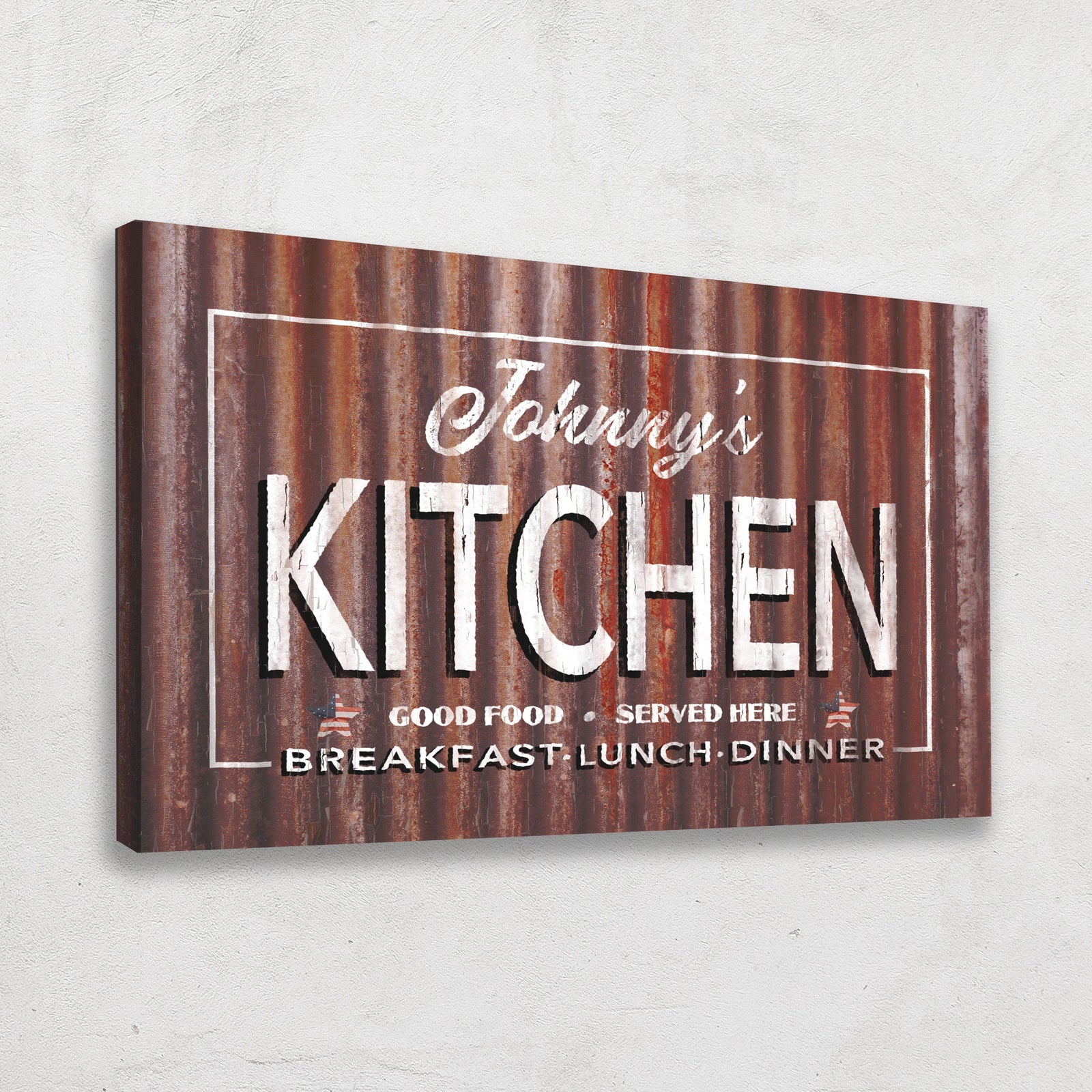 Personalized canvas sign with sample name "Johnny's" above "Kitchen" in script, white lettering on distressed rust-textured background, with "Good Food Served Here" and "Breakfast Lunch Dinner" text below