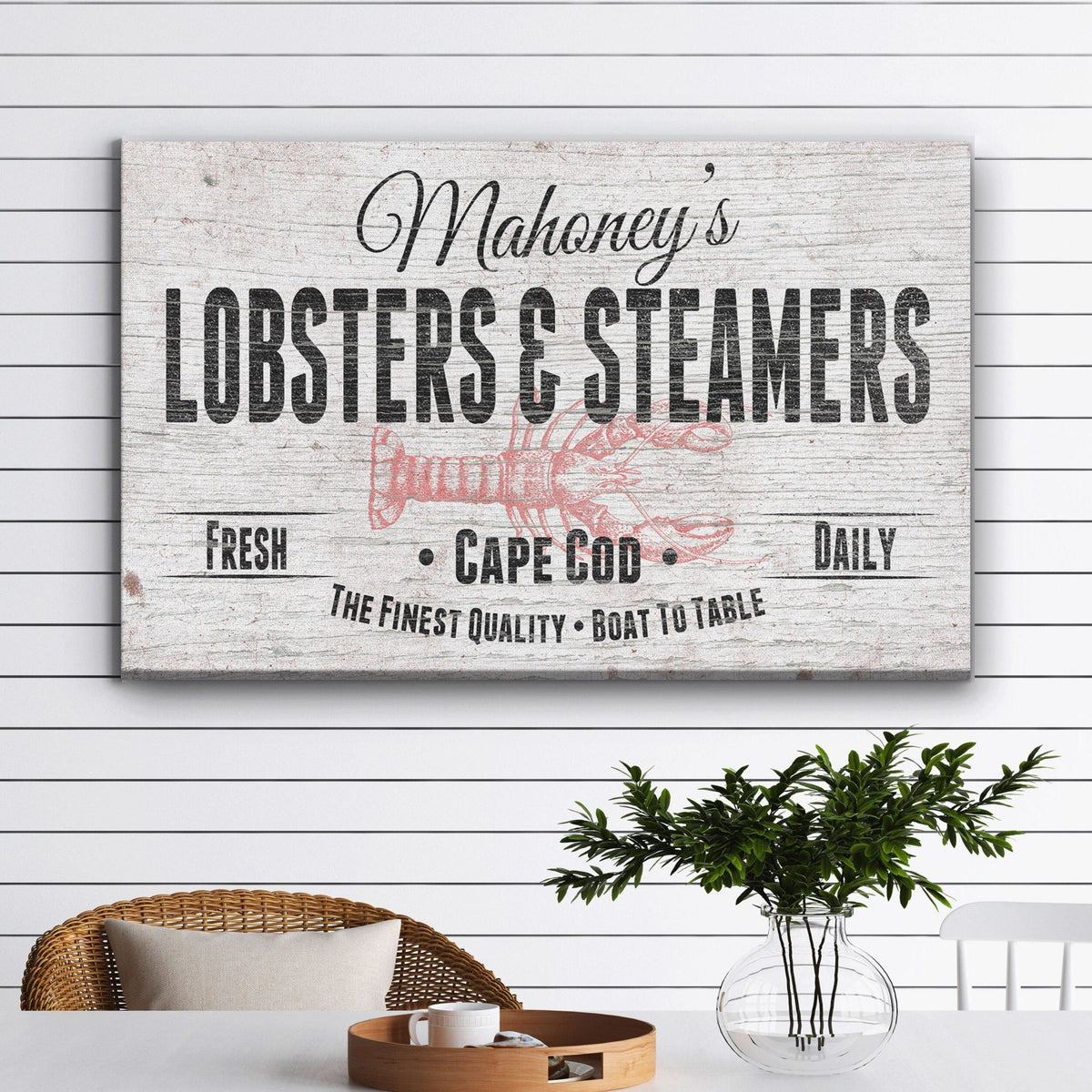 Lobster Shack Canvas showing "Mahoney's" in black script above bold "Lobsters &amp; Steamers" lettering with a pink lobster illustration and "Fresh · Cape Cod · Daily" on a distressed white wood background, mounted on a shiplap wall