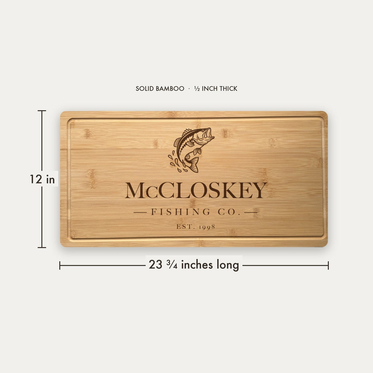 Size chart for the engraved bass fishing cutting board, 23 3/4 inches long, 12 inches wide and 1/2 inch thick in solid bamboo for the lake house.