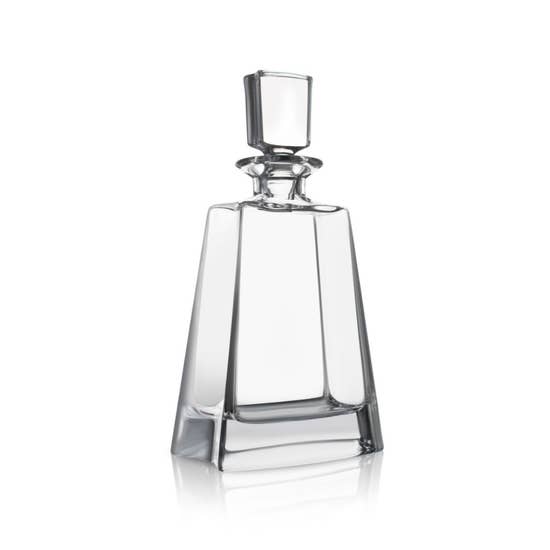 Crystal whiskey decanter with angular geometric design and matching glass stopper, shown against white background