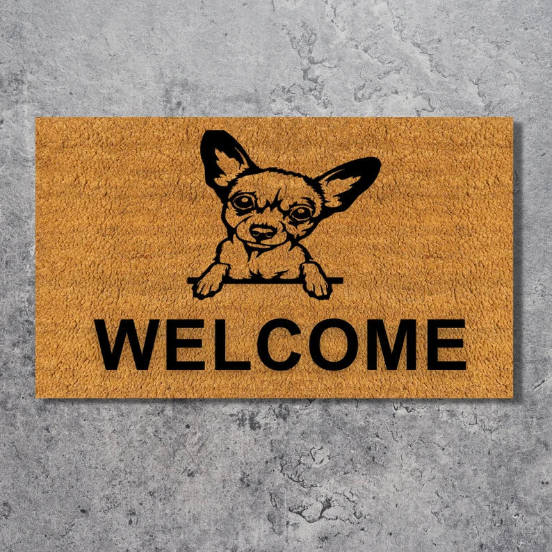 Tan coir doormat with black chihuahua illustration and paws design above the word "WELCOME